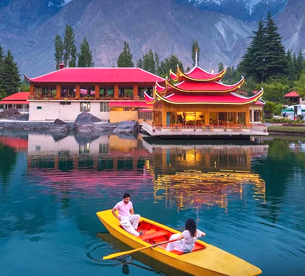 Boating on Lower Kachura Lake at Shangrila Resort during a Skardu Valley tour package